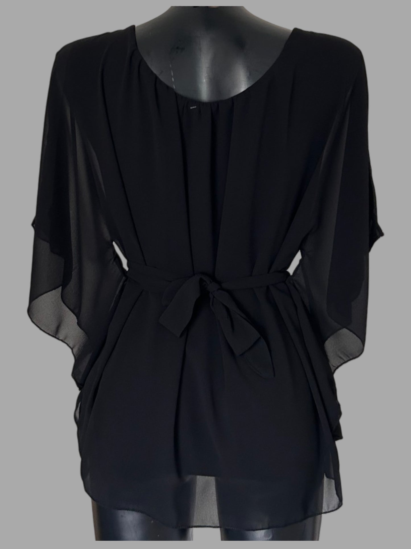 Blusa elegante con cintura strass