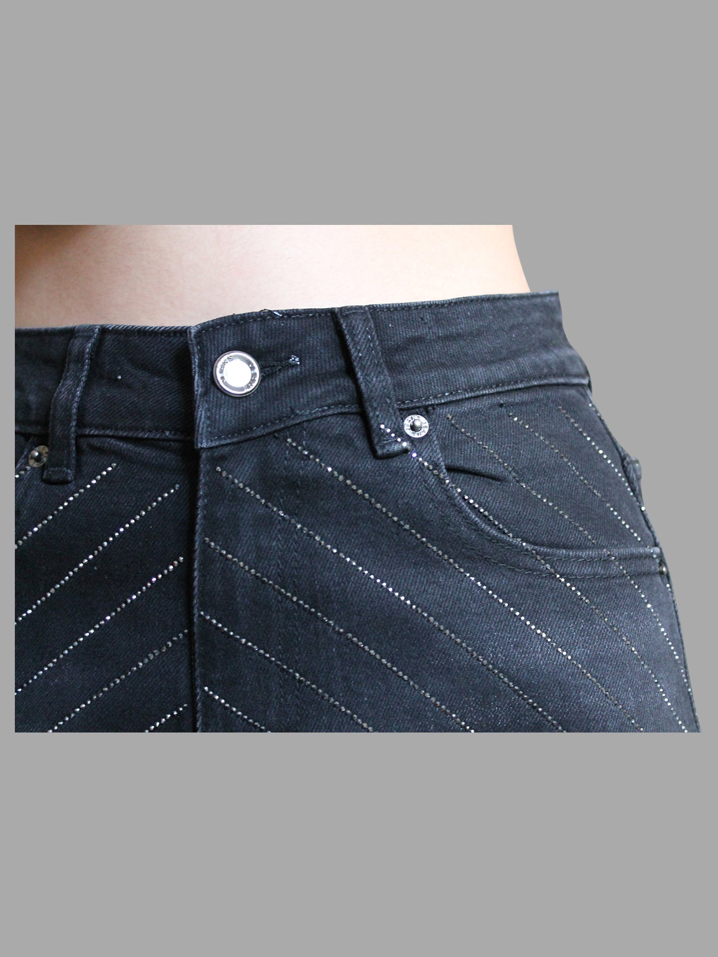 Jeans nero a palazzo con strass