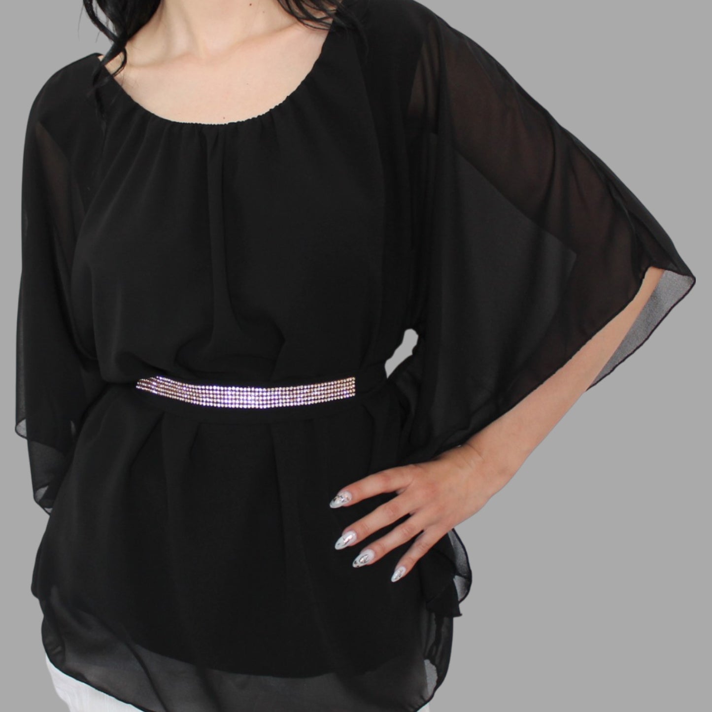 Blusa elegante con cintura strass