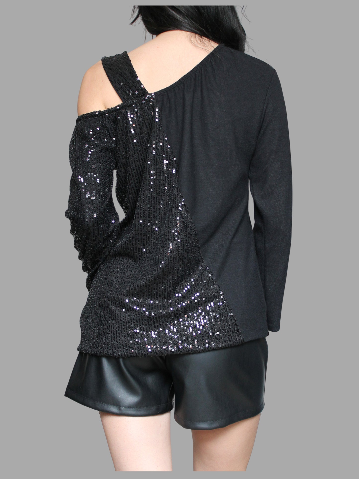 Maglia monospalla con paillettes