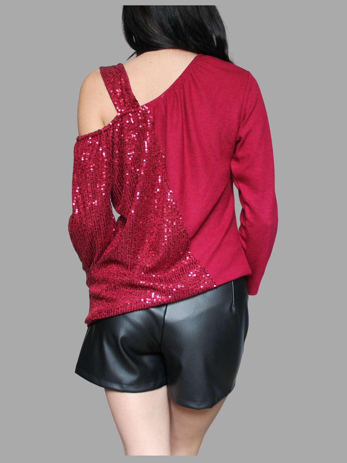 Maglia monospalla con paillettes